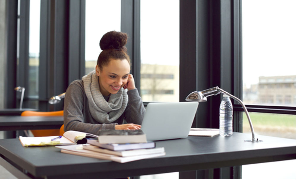 Women Smiling While At Work